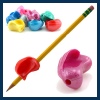 The Crossover Grip uses the same design as the pencil grip but has added wings to prevent fingers from crossing over each other.